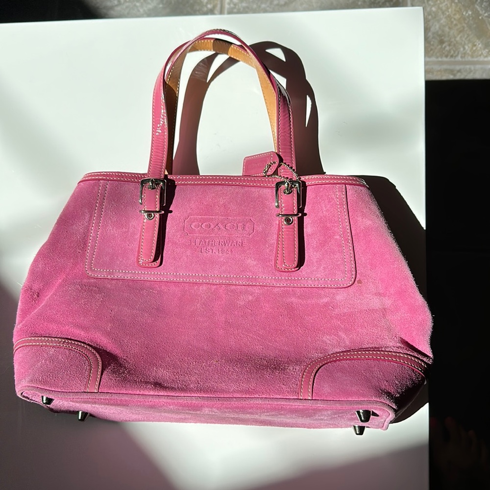 Perfect to take to the Barbie movie!! Pink suede Coach bag with feet.
